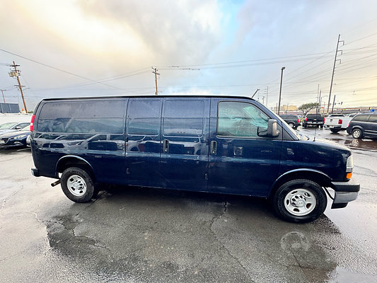 Q. HERO CHEVY BLUE VAN SIDE