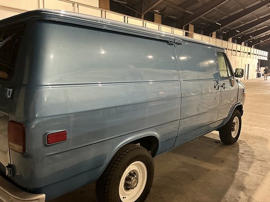 D. BLUE CHEVY VAN RIGHT SIDE