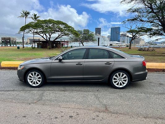 C. 2014 AUDI A6 LEFT SIDE